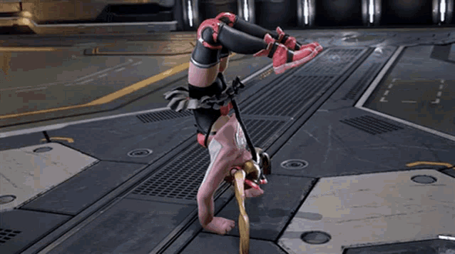 a video game character is doing a handstand on a platform