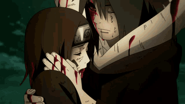 a man and a woman are hugging each other with blood on their faces