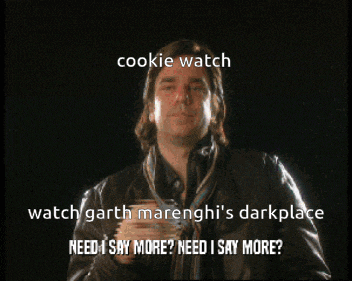 a man in a leather jacket says " cookie watch watch garth marenghi 's darkplace "