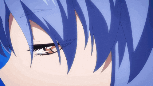 a close up of a person 's eye with a blue background