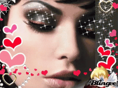 a close up of a woman 's face with hearts around it and the word blingee at the bottom