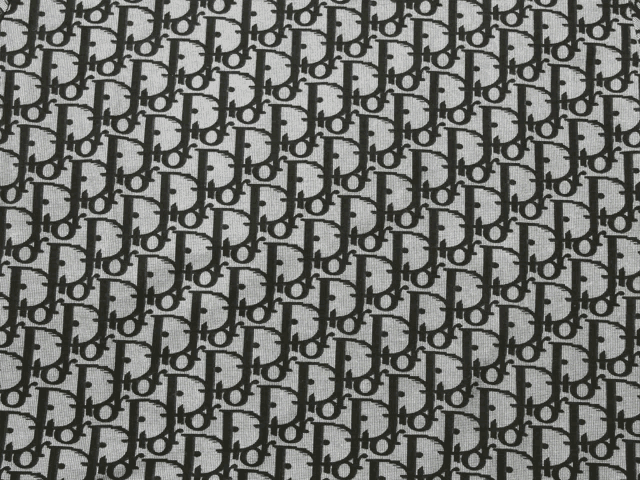 a black and white dior pattern on a white surface
