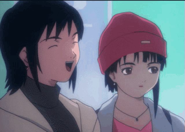 two anime characters one wearing a red hat