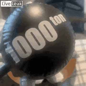 a black balloon with the word 1000 on it