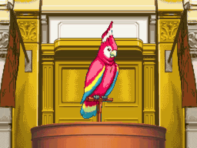 a colorful parrot is sitting on a podium in front of a yellow door