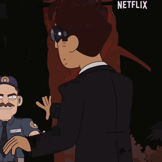 a man in a suit and tie is looking through binoculars while a security guard looks on