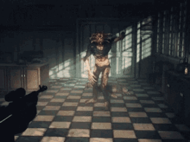 a person holding a gun in front of a monster in a room