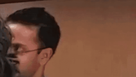 a close up of a man 's face with the word yahoo written above him .