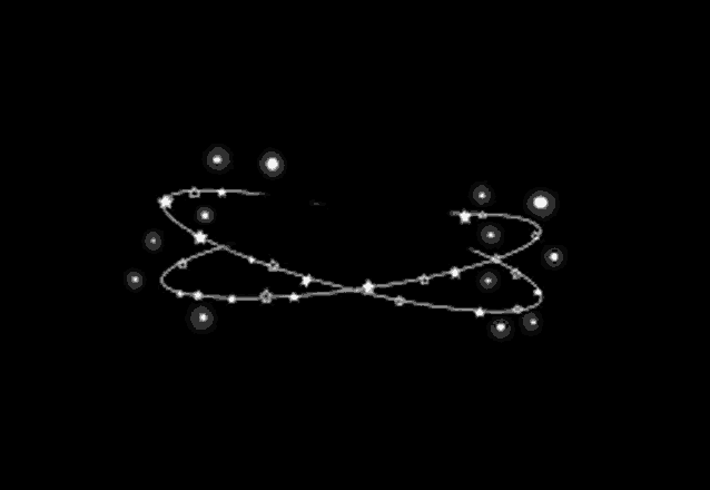 a string of christmas lights on a black background .