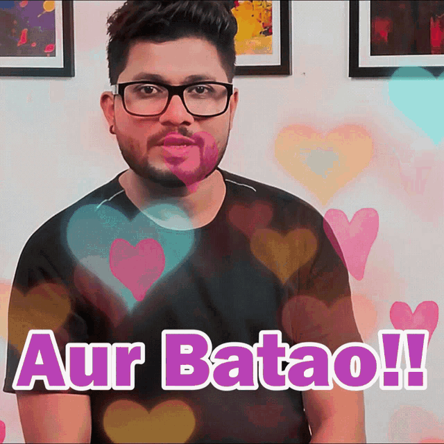 a man wearing glasses and a black shirt with the words aur batao