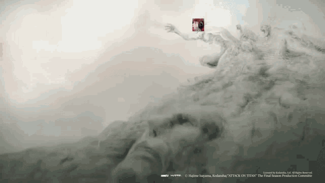 an advertisement for attack on titan shows a statue of a man