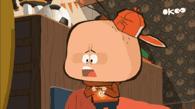 a cartoon character wearing an orange hat with the word okeo on the bottom right