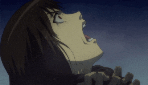 a close up of a person 's face with their mouth wide open