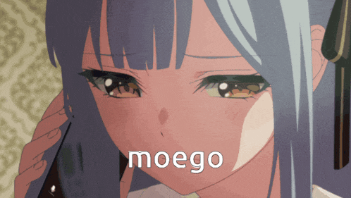 a close up of a girl 's face with the word moego on the bottom right
