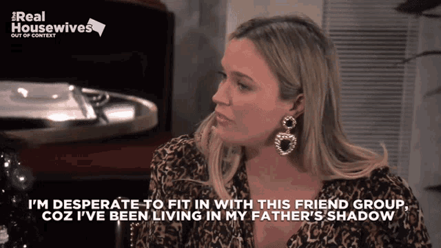 a real housewives poster with a woman in a leopard print top