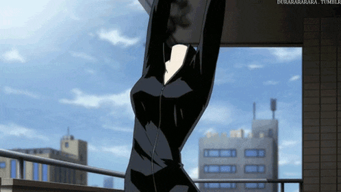 a woman in a black bodysuit is hanging from a rope