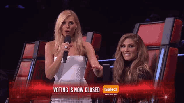 a woman speaking into a microphone with the words voting is now closed below her