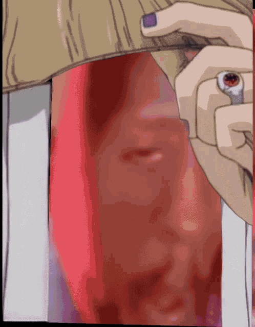 a close up of a person 's face with a purple nail polish