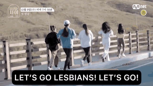 let 's go lesbians let 's go is written on a sign