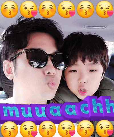 a picture of a man and a child with a purple sign that says muuachl