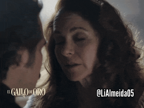 a man and a woman are looking at each other with the words el gallo de oro below them