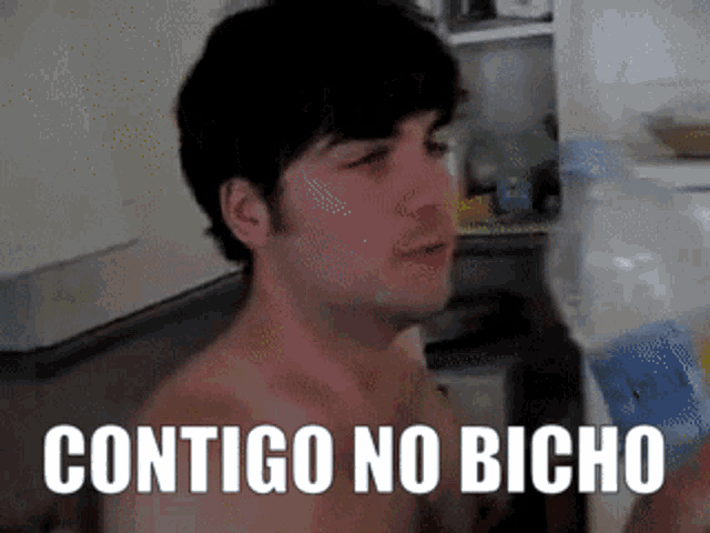 a man without a shirt says contigo no bicho in white letters