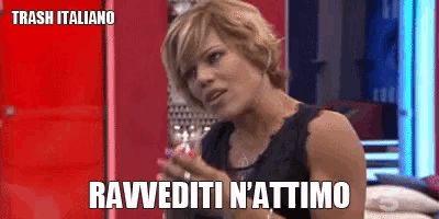 a woman in a black tank top is saying rawediti n'attimo
