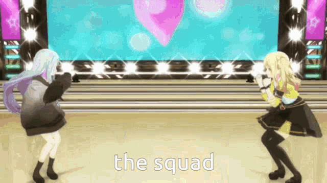 two anime girls are dancing on a stage with the words " the squad " behind them