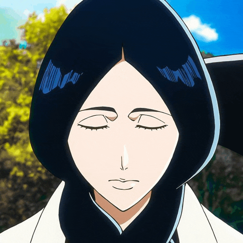 a close up of a cartoon character with her eyes closed