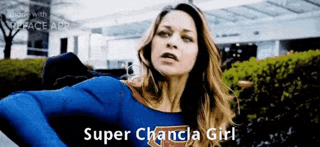 a woman in a super chancia girl costume stands in front of a building .