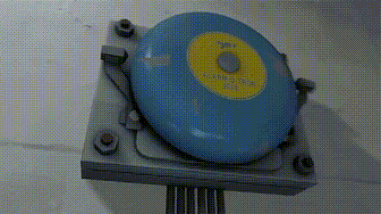 a close up of a blue object with a yellow circle that says " emergency "