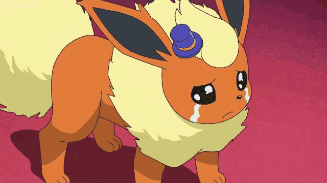 a cartoon eevee with a blue top hat on its head is crying