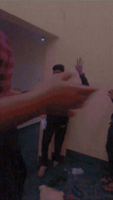 a blurry photo of a man wearing a mask