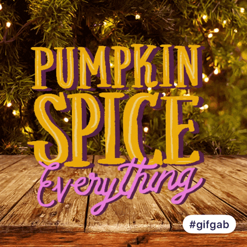 a sign that says pumpkin spice everything is on a wooden surface