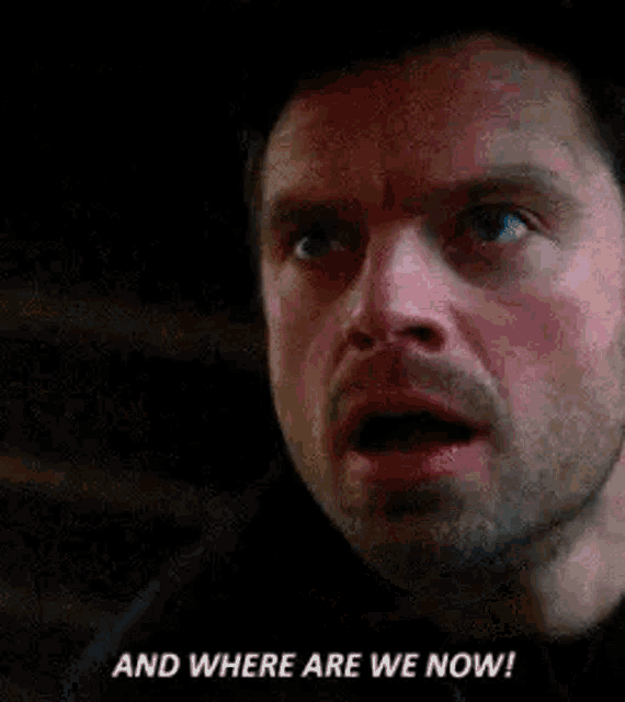 a close up of a man 's face with a surprised look on his face and the words `` and where are we now '' .
