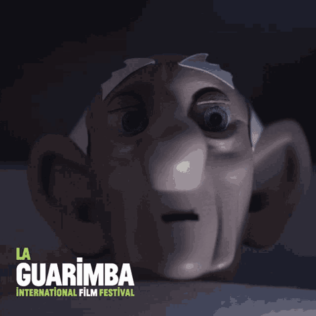 a poster for la guarimba international film festival shows a cartoon character