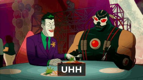 the joker and bane are sitting at a table eating