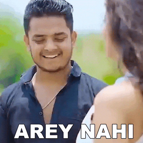 a man is smiling while looking at a woman and the words arey nahi are visible