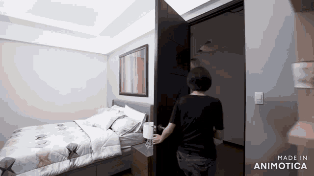 a woman is opening a door in a bedroom with the words made in animotica on the bottom