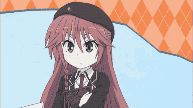a girl in a black hat is holding a book in her hand