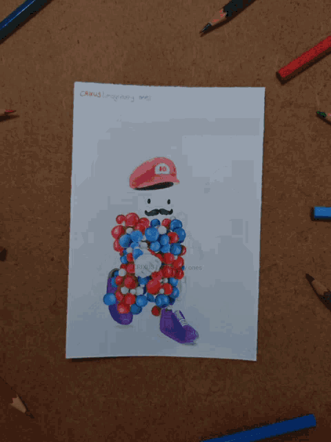 a drawing of a man with a green hat and a mustache is surrounded by pencils