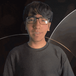 a man wearing glasses and a black shirt with the word devin on it