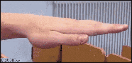 a close up of a person 's hand with the website datgif.com in the corner