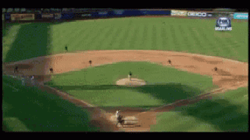 an aerial view of a baseball field with a geico ad on the outfield wall