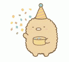 a hedgehog wearing a party hat is holding a cup of candy .
