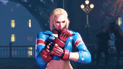 a woman in a blue jacket with a british flag on the back