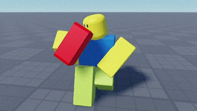 a roblox character is holding a red brick in his hands and smiling .