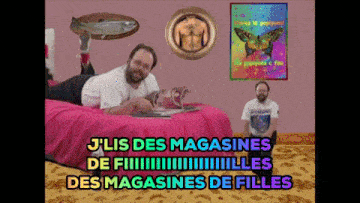 a man laying on a bed reading a magazine with the words j'lis des magasines de filles at the bottom