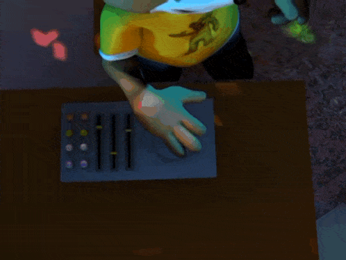 a teddy bear wearing headphones and a yellow shirt with a bear on it