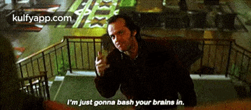 a man is giving the middle finger and saying i 'm just gonna bash your brains in .